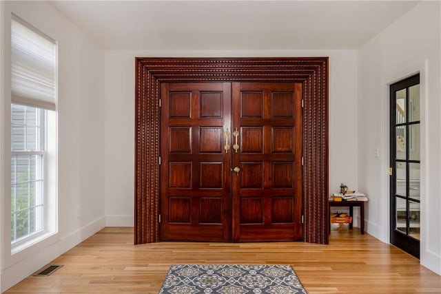 313 Wexford Ln, Horseheads, NY 14845 - foyer featuring light wood-style flooring and baseboards