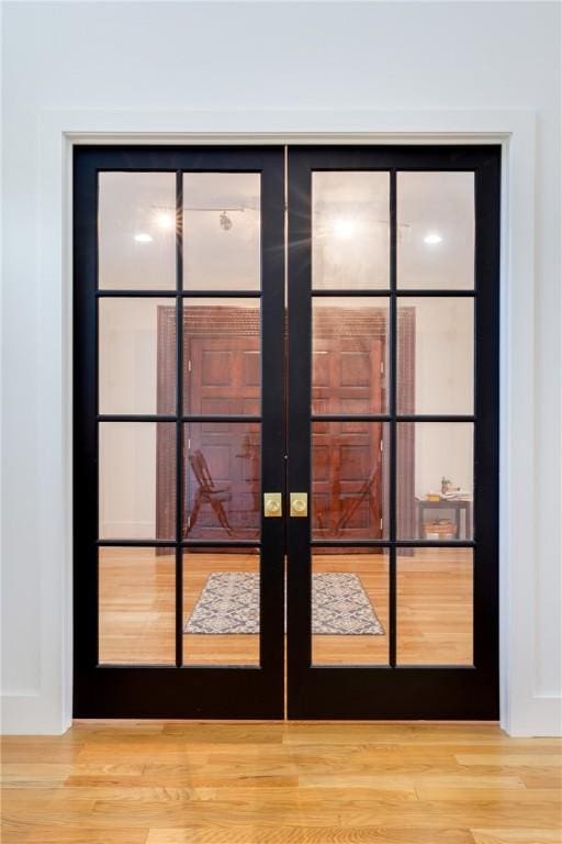 313 Wexford Ln, Horseheads, NY 14845 - doorway to outside with french doors and wood finished floors