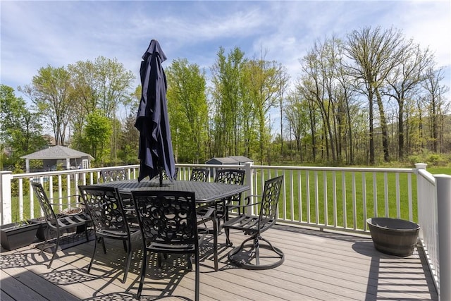 313 Wexford Ln, Horseheads, NY 14845 - wooden terrace with a lawn, outdoor dining space, and an outdoor structure
