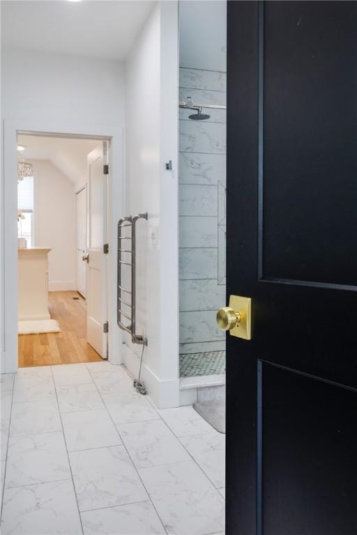 313 Wexford Ln, Horseheads, NY 14845 - hallway featuring marble finish flooring and vaulted ceiling