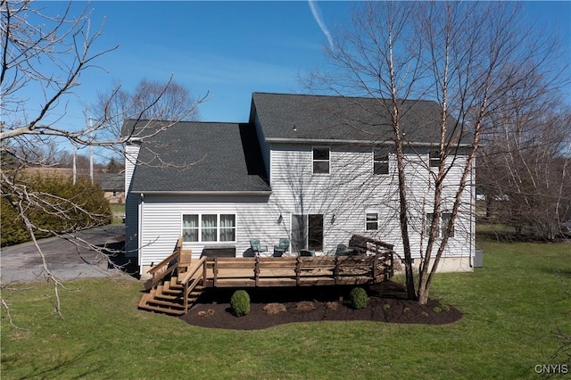 3817 Jordan Rd, Skaneateles, NY 13152 - rear view of house with a wooden deck, a yard, and roof with shingles