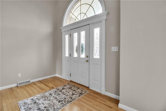 670 Raymond Dr, Lewiston, NY 14092 - entryway with wood finished floors and baseboards