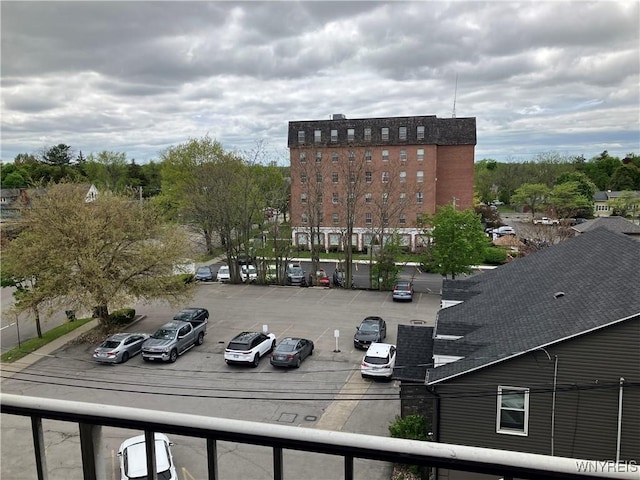 5854 Main St Unit 407, Amherst, NY 14221 - view of building exterior featuring uncovered parking