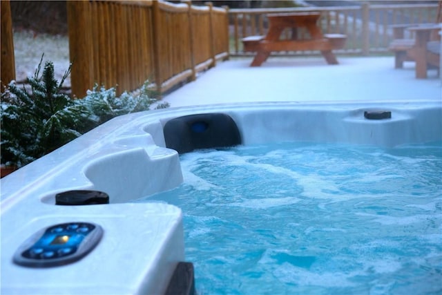 view of pool featuring a hot tub