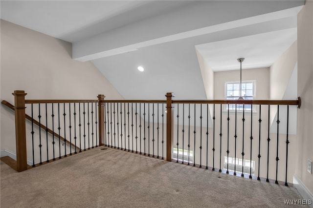 corridor featuring baseboards, carpet, an upstairs landing, and recessed lighting