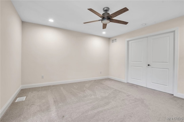 unfurnished bedroom with carpet, recessed lighting, baseboards, ceiling fan, and a closet
