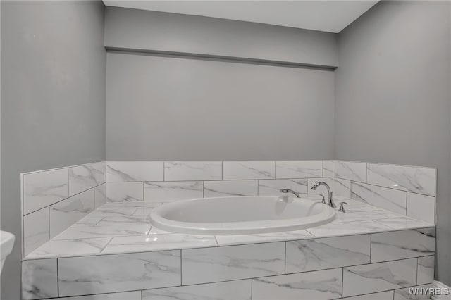 bathroom featuring a garden tub