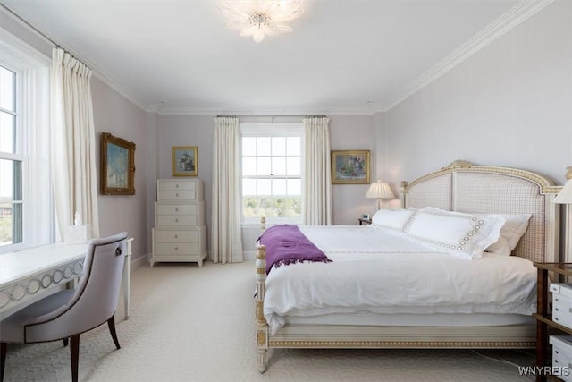 carpeted bedroom with crown molding and baseboards