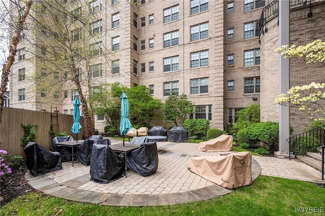 view of patio / terrace featuring fence and area for grilling