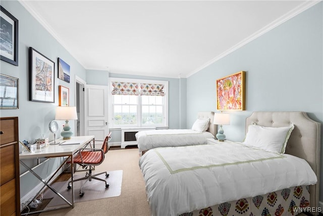 bedroom with ornamental molding, an office area, and carpet