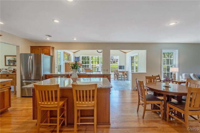4268 Colorado Run, Onondaga, NY 13215 - dining area featuring light wood-style floors and recessed lighting