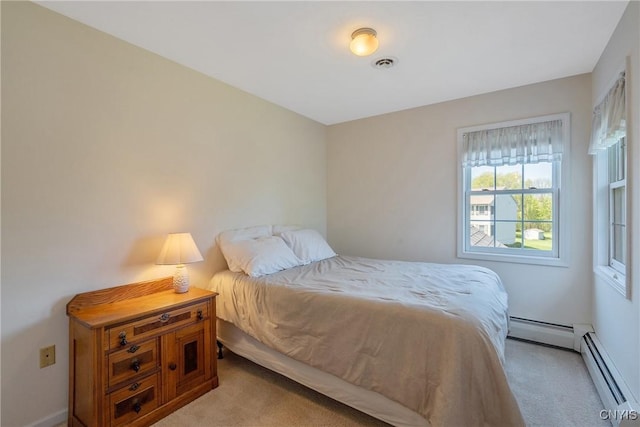 4268 Colorado Run, Onondaga, NY 13215 - bedroom with light colored carpet and a baseboard radiator