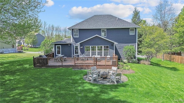4268 Colorado Run, Onondaga, NY 13215 - back of house featuring an outdoor fire pit, a wooden deck, and roof with shingles