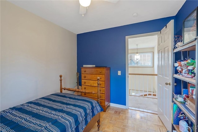 4268 Colorado Run, Onondaga, NY 13215 - bedroom featuring a ceiling fan and a chandelier