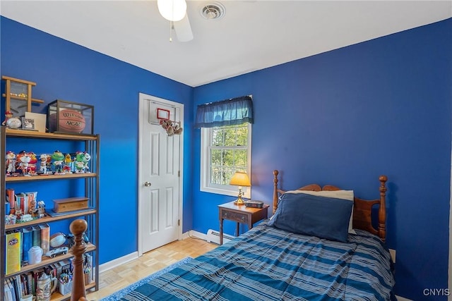 4268 Colorado Run, Onondaga, NY 13215 - bedroom with baseboards, a baseboard heating unit, and ceiling fan