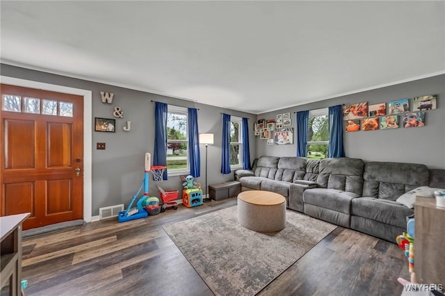 11965 Clinton St, Marilla, NY 14004 - living area with healthy amount of natural light, wood finished floors, and baseboards