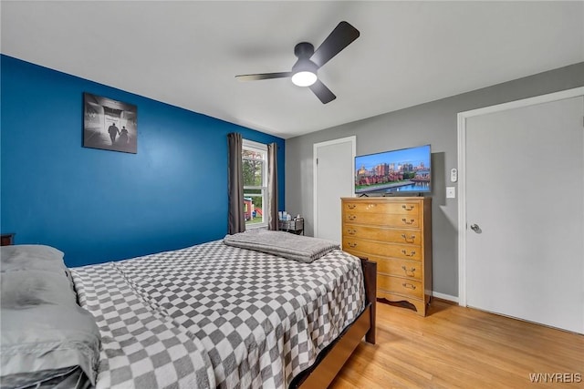 11965 Clinton St, Marilla, NY 14004 - bedroom with light wood-style floors and ceiling fan