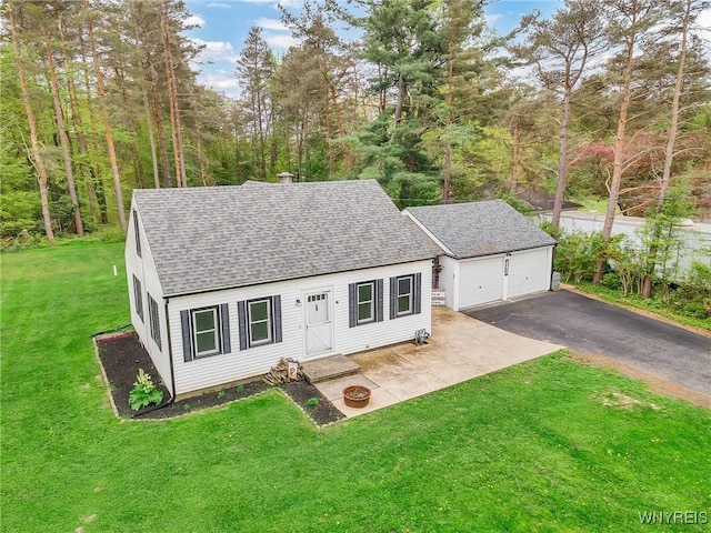 11965 Clinton St, Marilla, NY 14004 - view of front of property featuring a shingled roof, an outdoor structure, a front lawn, and a chimney