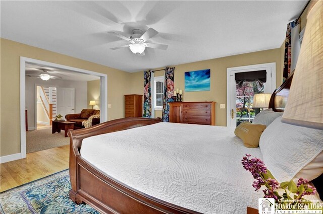 32 Howard Hanson Ave, Chautauqua, NY 14722 - bedroom featuring wood finished floors, a ceiling fan, and baseboards