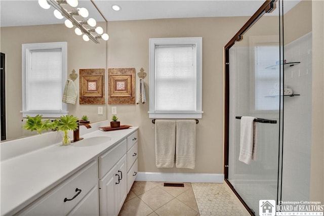 32 Howard Hanson Ave, Chautauqua, NY 14722 - full bath with a shower stall, vanity, tile patterned flooring, and baseboards