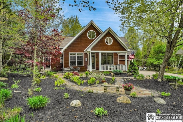 32 Howard Hanson Ave, Chautauqua, NY 14722 - view of front facade featuring covered porch