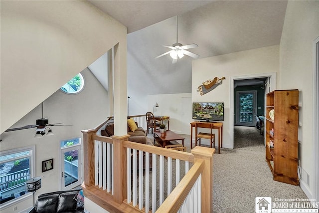 32 Howard Hanson Ave, Chautauqua, NY 14722 - hallway featuring healthy amount of natural light, carpet flooring, and high vaulted ceiling