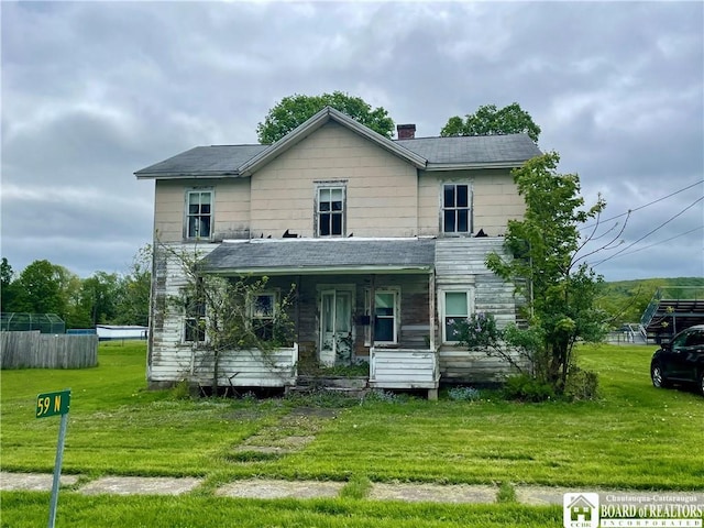 59 N Franklin St, New Albion, NY 14719 - view of front of house featuring a front lawn, covered porch, roof with shingles, and a chimney