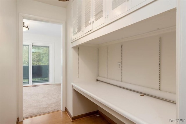 mudroom featuring light wood-style floors