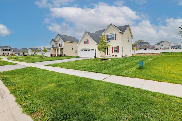 traditional home with a residential view, a front lawn, and concrete driveway