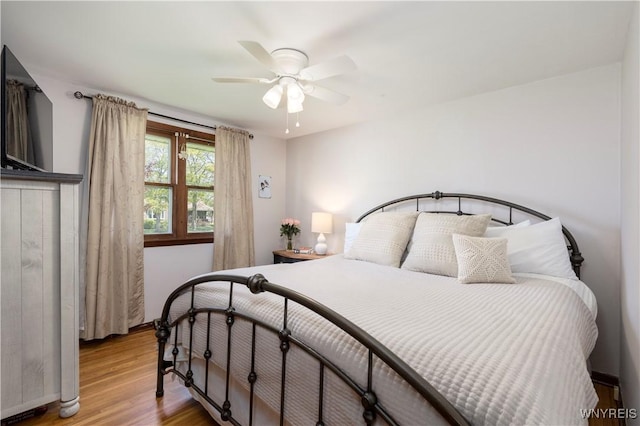 30 Schultz Rd, Orchard Park, NY 14127 - bedroom with light wood-type flooring, baseboards, and a ceiling fan