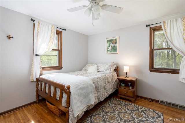 30 Schultz Rd, Orchard Park, NY 14127 - bedroom with wood finished floors, baseboards, and ceiling fan
