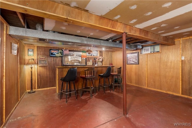 30 Schultz Rd, Orchard Park, NY 14127 - indoor dry bar with finished concrete flooring and wooden walls