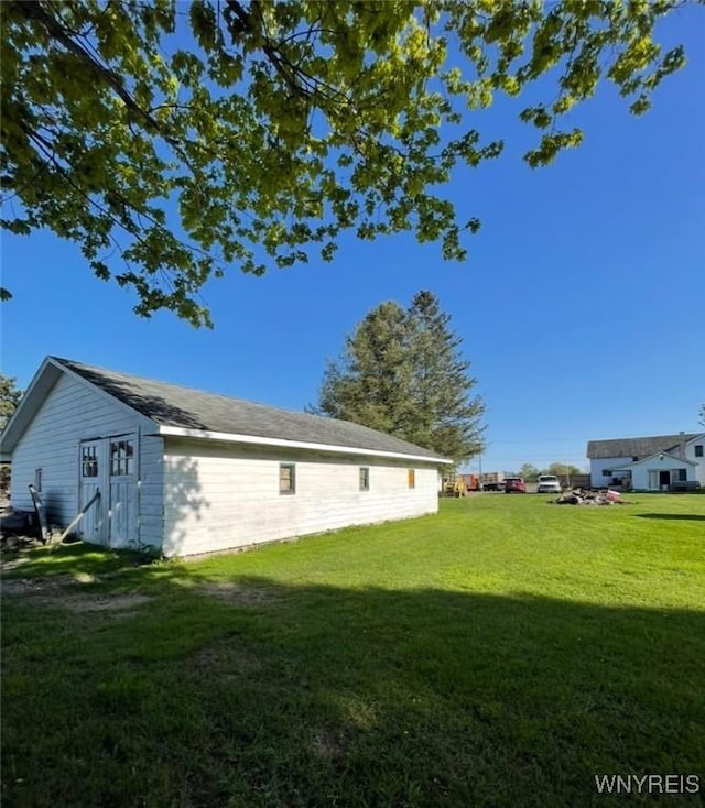 12866 Genesee Rd, Sardinia, NY 14030 - rear view of property featuring a lawn and an outdoor structure