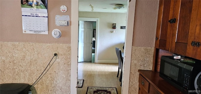 12866 Genesee Rd, Sardinia, NY 14030 - hallway featuring wood finished floors and baseboards