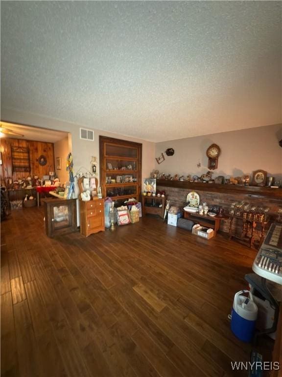 116 Fuller Ave, Tonawanda-City, NY 14150 - living area with a textured ceiling and wood finished floors