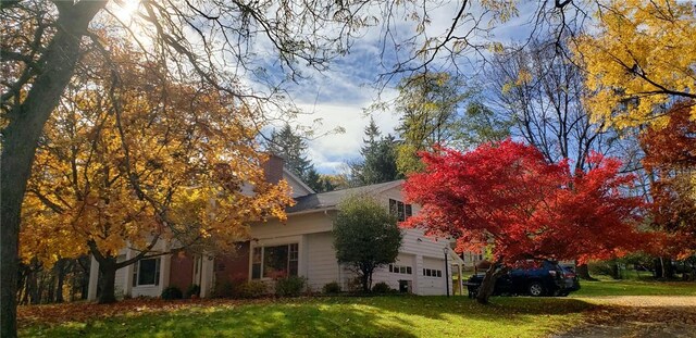 52 High St, Alfred, NY 14802 - view of side of property with a yard