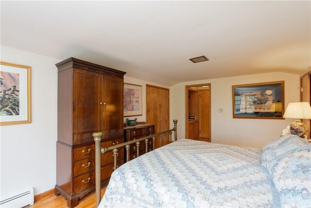 52 High St, Alfred, NY 14802 - bedroom featuring baseboard heating and light wood-type flooring