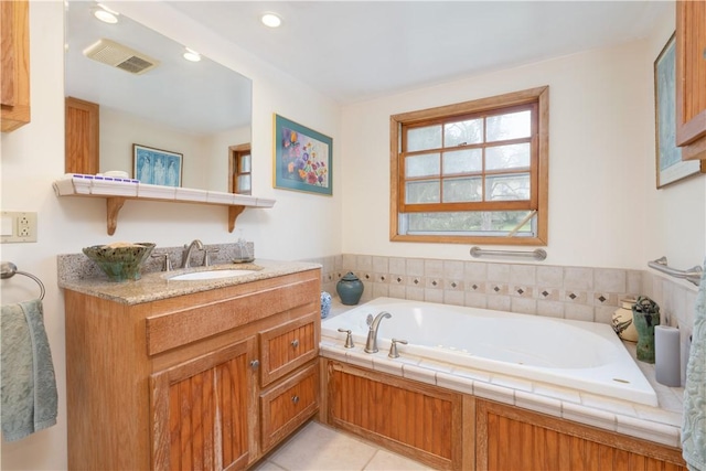 52 High St, Alfred, NY 14802 - bathroom with a garden tub, vanity, recessed lighting, and tile patterned flooring