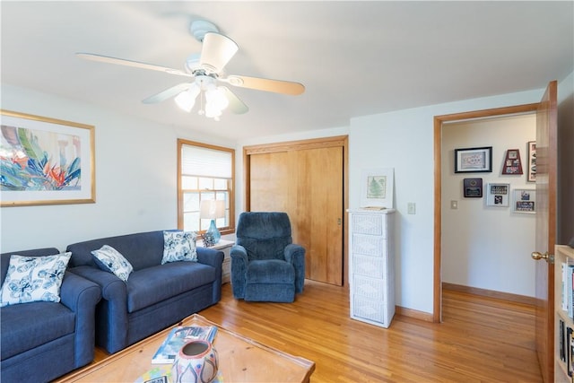 52 High St, Alfred, NY 14802 - living room with light wood-style flooring, ceiling fan, and baseboards