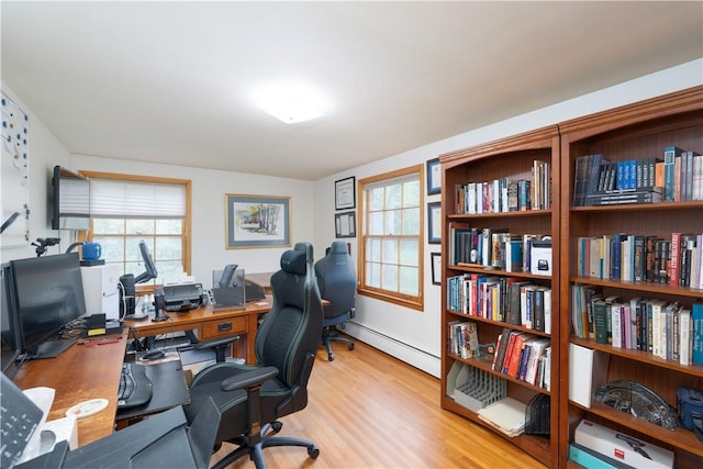 52 High St, Alfred, NY 14802 - home office featuring a baseboard heating unit and wood finished floors
