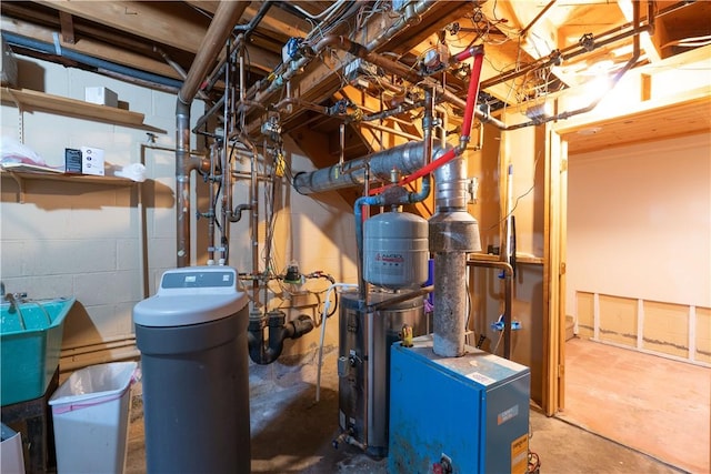 52 High St, Alfred, NY 14802 - utility room featuring a sink and a heating unit