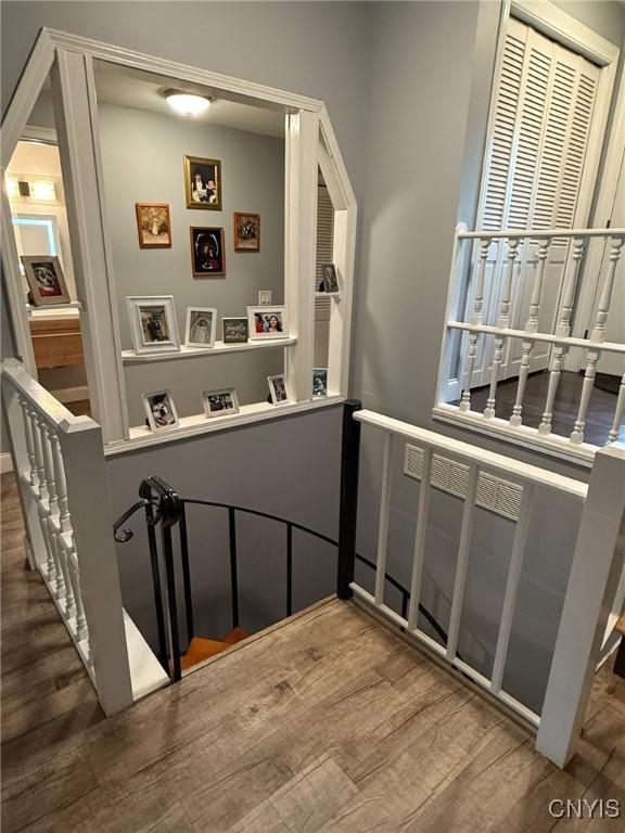 1404 Riverbend Dr, Lysander, NY 13027 - stairway featuring wood finished floors