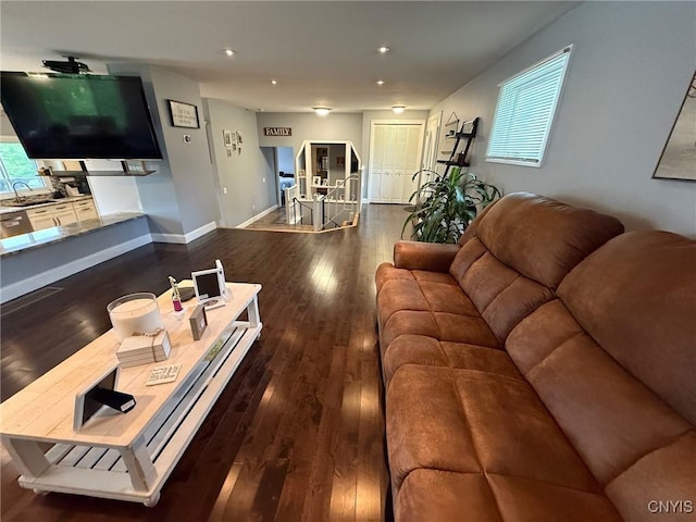 1404 Riverbend Dr, Lysander, NY 13027 - living room featuring dark wood finished floors, recessed lighting, and baseboards