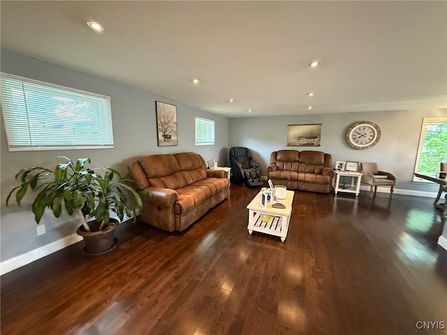 1404 Riverbend Dr, Lysander, NY 13027 - living area with healthy amount of natural light, dark wood finished floors, recessed lighting, and baseboards