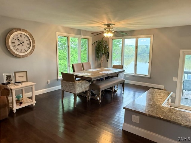 1404 Riverbend Dr, Lysander, NY 13027 - dining area featuring baseboards, a ceiling fan, and dark wood-style flooring