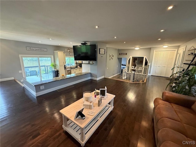 1404 Riverbend Dr, Lysander, NY 13027 - living area with recessed lighting, baseboards, and dark wood finished floors
