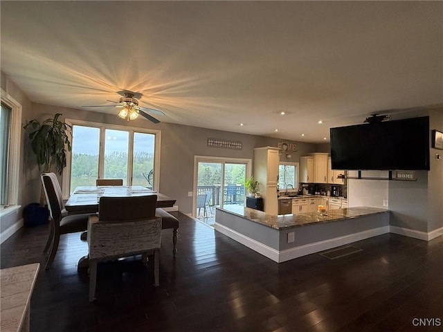 1404 Riverbend Dr, Lysander, NY 13027 - kitchen with baseboards, ceiling fan, recessed lighting, dark wood-style flooring, and dishwasher