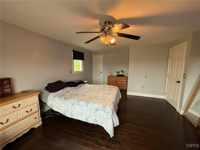 1404 Riverbend Dr, Lysander, NY 13027 - bedroom featuring baseboards, dark wood-type flooring, and ceiling fan