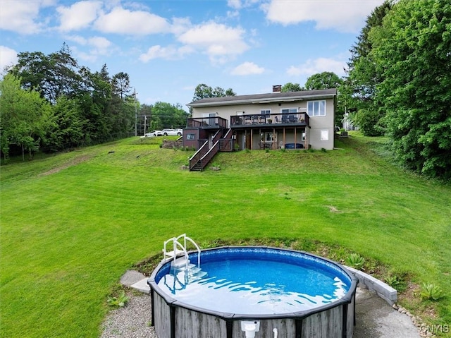 1404 Riverbend Dr, Lysander, NY 13027 - back of property with a wooden deck, stairs, a yard, a hot tub, and a chimney