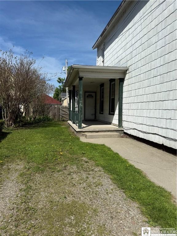 104 King St, Dunkirk-City, NY 14048 - view of home's exterior with a porch